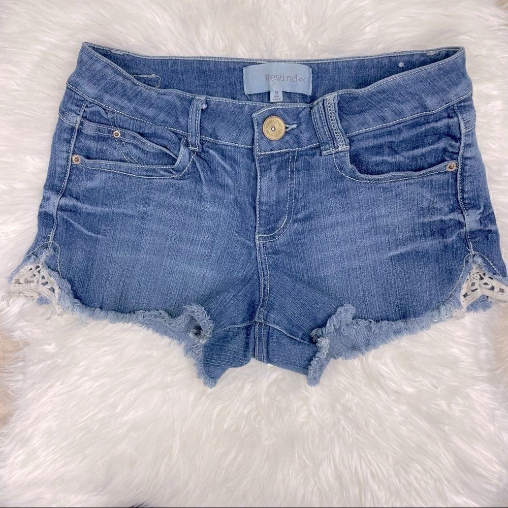 Rewind | embroidered denim shorts 9.0 cut off distressed daisy dukes.